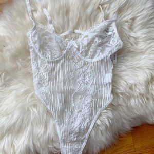 SOLD New with tags small white lace body suit
